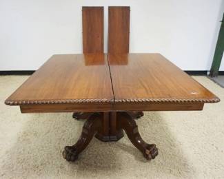 1173	ANTIQUE MAHOGANY SQUARE TABLE W/CLAW FOOT PEDISTAL BASE & 2-16 IN LEAVES, APPROXIMATELY 52 IN SQUARE X 30 IN HIGH
