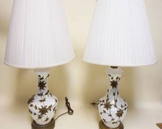 1274	PAIR OF IRIDESCENT WHITE TABLE LAMPS W/APPLIED VINES & FLOWERS, APPROXIMATELY31 IN HIGH, ONE SHADE HAS SOME STAINING
