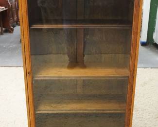 1220	SOLID OAK NORTHWIND CARVED ONE DOOR BOOKCASE W/ADJUSTABLE SHELVES & CLAW FOOT FRONT LEGS, APPROXIMATELY 35 IN X 15 IN X 57 IN HIGH
