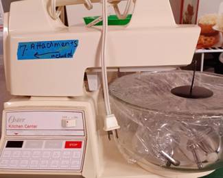 OSTER COMPLETE KITCHEN CENTER. OVER 8 ATTACHMENTS. 