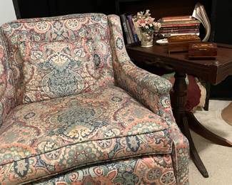 1 of 2 swivel paisley print chairs