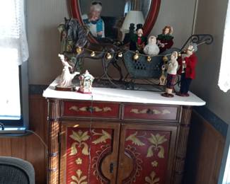 decorated cabinet with matching mirror