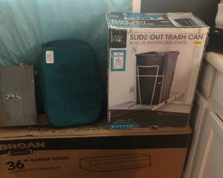 new slide out trash can and Broan range hood