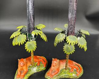 Pair ceramic lioness with metal palmtree candleholders $150