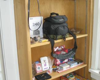 Binoculars, Nikon D40 digital camera, board games