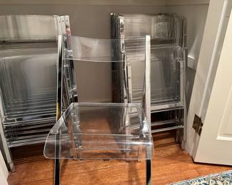Each Chest / Table comes with 12 Lucite folding Chairs