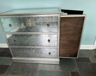 Three Tables that store Inside Mirrored Chest. There are two chest available