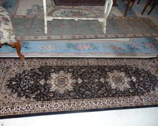 Oriental rugs and runners (items sold separately).