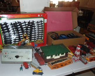 HO and other gauge train cars, engines and buildings (some sold separately).