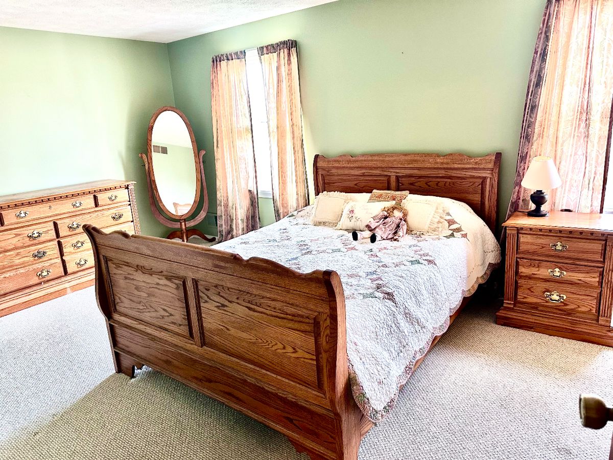 $700 set.  Beautiful high quality solid oak bedroom set including Queen Sleigh Bed,  Oak 7-drawer Dresser 64"w 19"d 36"h, and nightstand 25”w 17”d 27”h.  Made by Richardson Brothers Company.  Made in USA in Sheboygan, Wisconsin.   Will separate $450 bed, $350 dresser, $150 nightstand.   Smoke and pet free clean home.  Mirror not included / not for sale.  