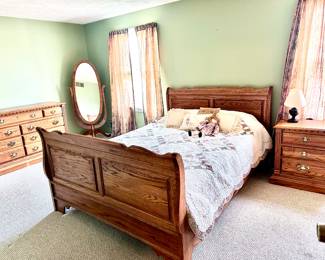 $700 set.  Beautiful high quality solid oak bedroom set including Queen Sleigh Bed,  Oak 7-drawer Dresser 64"w 19"d 36"h, and nightstand 25”w 17”d 27”h.  Made by Richardson Brothers Company.  Made in USA in Sheboygan, Wisconsin.   Will separate $450 bed, $350 dresser, $150 nightstand.   Smoke and pet free clean home.  Mirror not included / not for sale.  