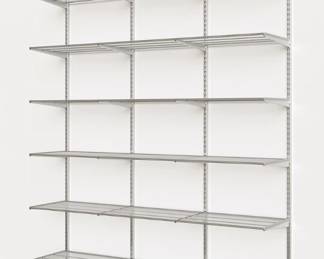 Elfe Classic Platium system 6ft wide 16 inches deep (6 shelves) also included is another half system 6ft wide 12 inches deep (3 shelves) plus extra 4 ft 16 inch deep shelf. Configuration is flexible and if purchased today from container store your cost would be over $1300 not at the estate sale almost $1000 off