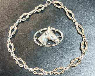 Sterling horse pin
Sterling love knot necklace