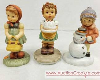 Three Berta Hummel Figurines.