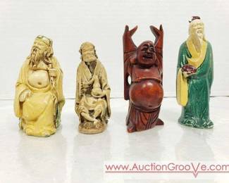 9 Figurines featuring Buddha.