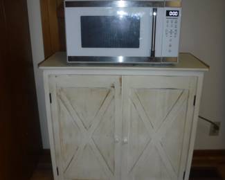 Micro Wave and Off White Stressed Cabinet 