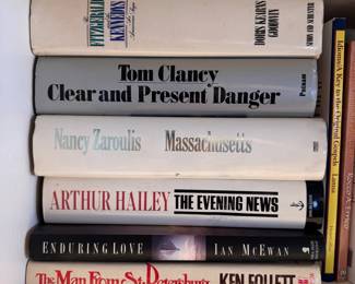 Group of books including The Evening News