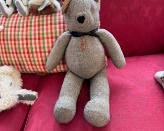 Cloth bear, manufactured by Men's Clothing Code Authority, one ear is loose and needs to be stitched into place 20"