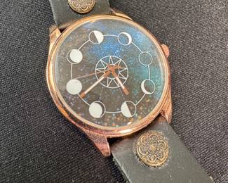 Jewelry Lot#9 TOMI stainless steel watch with a leather band, needs a battery