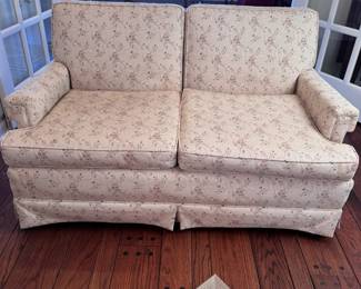 Cream floral loveseat (R), low seat height of 17", spotting to fabric in several areas, 32"D x 56"W