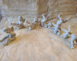 Tumbling porcelain cherubs, set of 6