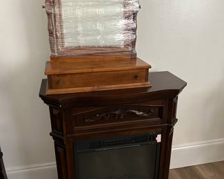 Ethan Allen nutmeg maple one drawer shaving mirror and working electric fireplace.