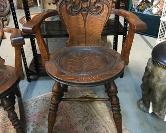 Exceptional North Wind Face carved on back Arm Chair. Dark Oak.  Patina is beautiful.  Excellent condition.