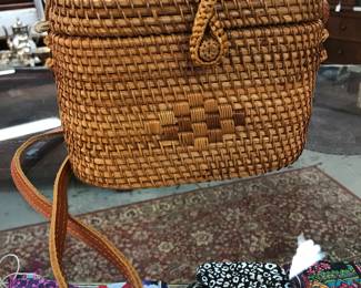 This little straw bag/basket Made in Vietnam.  Excellent workmanship and condition.