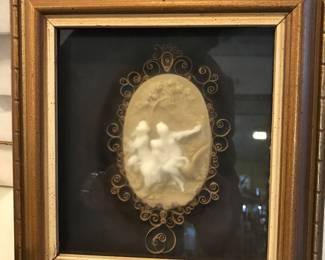 Carved cameo scene with quilling around oval and framed beautifully