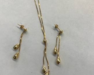 Gold tone necklace and earrings