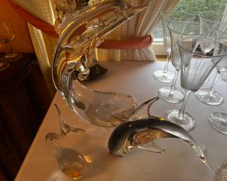 Glass whales…one damaged