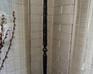 Tall iron candlestick