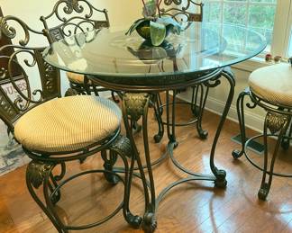 4 HEAVY METAL SWIVEL CHAIRS & TABLE