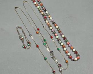(4PC) BEADED JEWELRY | Gold-tone jewelry, including two similar beaded necklaces and a triple strand beaded bracelet all stamped "KOREA" on clasp; plus an unmarked multi-color beaded necklace with alternating gold-tone beads (l. 12 in.)

