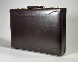 LEATHER PRESTO BRIEFCASE | Dark maroon/brown sturdy leather briefcase with two combination locks at metal latches. -  l. 18 x w. 13 x h. 4 in

