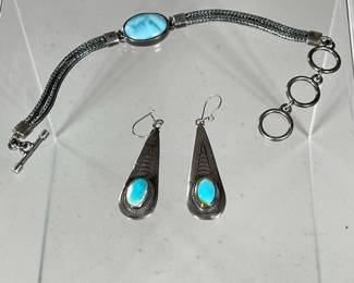 (3PC) STERLING & TURQUOISE JEWELRY | Including a pair of Sterling and turquoise droplet earrings with a matching turquoise and Sterling braided bracelet. - l. 9 in (bracelet length)

