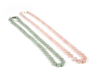 (2PC) CHINESE JADE BEADED NECKLACES | Including a pale green jade beaded necklace with a cloisonne clasp and a pink jade or rose quartz beaded necklace; together 149.5g. - l. 22 in (green jade)
