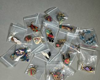 COLLECTION OF ENAMELED EARRINGS | Colorful enamel earrings depicting nature and animals.

