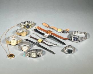 ASSORTED WATCHES | Multiple watches made of various materials including Stainless steel, wood, & leather. 
