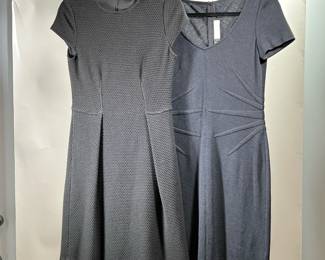 (2PC) BLACK "ST. JOHN COLLECTION" DRESSES | Including a black knit dress with a starburst pattern (size 6) and a textured knit dress (size 4).
