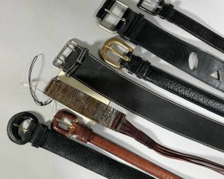 (7PC) LEATHER BELT GROUP | Group of vintage leather belts, with brands including Max Mara (new with tag), Harve Benard, Cacharel, Cipriani, Calvin Klein, Joan Helpern. Two thick belts, one with a divided loop, one with geometric cutouts.
