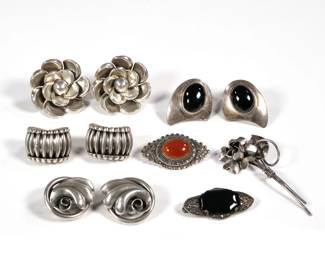 MISC. STERLING JEWELRY | Including an antique German openwork pin with marcasite and faceted black stone, a marcasite and carnelian sterling pin, two pairs of Danecraft earrings, a pair of Mexico Silver flower-form earrings, a pair of Mexican TS-62 cabochon earrings, and a flower-form pin; all together 2.72 ozt


