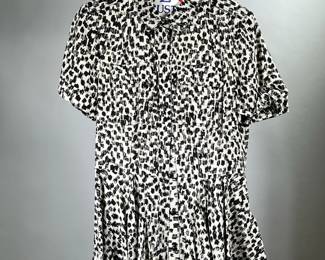 BURBERRY BRIT BLOUSE | Viscose printed blouse with a ruffled hem, size 4.

