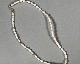 PEARL & 14K NECKLACE | Baroque pearl and 14k yellow gold beaded necklace, marked 14K on the clasp insert; 8.3g. -  l. 16 in
