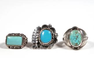 (3PC) STERLING & TURQUOISE RINGS | Including a rectangular light blue turquoise ring with openwork gallery, a ring with feather motif, and a ring signed with a stippled "V"; all together 1.04 ozt

