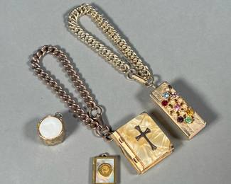 (4PC) VINTAGE PENDANTS & CHARMS | Interesting charms/jewelry, including a book-form locket box on a bracelet, an address book bracelet with colorful faux-gems (book l. 1.5 in.), a drum-form charm, and a book-form locket. 

