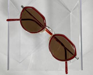 OLIVER PEOPLES SUNGLASSES | Oliver Peoples sleek retro prescription sunglasses with angular red and metallic wire frame. - l. 5 x w. 1.5 in
