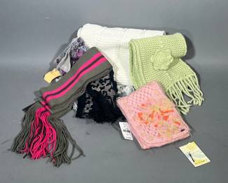 (6PC) [NWT] WOMEN'S SCARVES | Women's knit winter scarves, including Pink Free People scarf, made in India. Light green cashmere chunky knit scarf with flower decal. Raw 7 cashmere scarf with Gisele Tune tag. White Diesel chunky knit scarf. A black UZI scarf
A pink and green Express scarf
