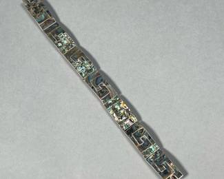 JHE MEXICAN STERLING BRACELET | Abalone/shell set in sterling silver, marked "JHE / TAXCO" on the clasp; 21.3g. - l. 7.25 in


