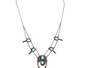 STERLING & SILVER SQUASH BLOSSOM | Native American squash blossom of small size, having six turquoise cabochons set in sterling silver on a sterling ball chain, pendant 1-3/8 x 1-1/8 in.; total weight 0.67 ozt. -  l. 16 in (chain)
